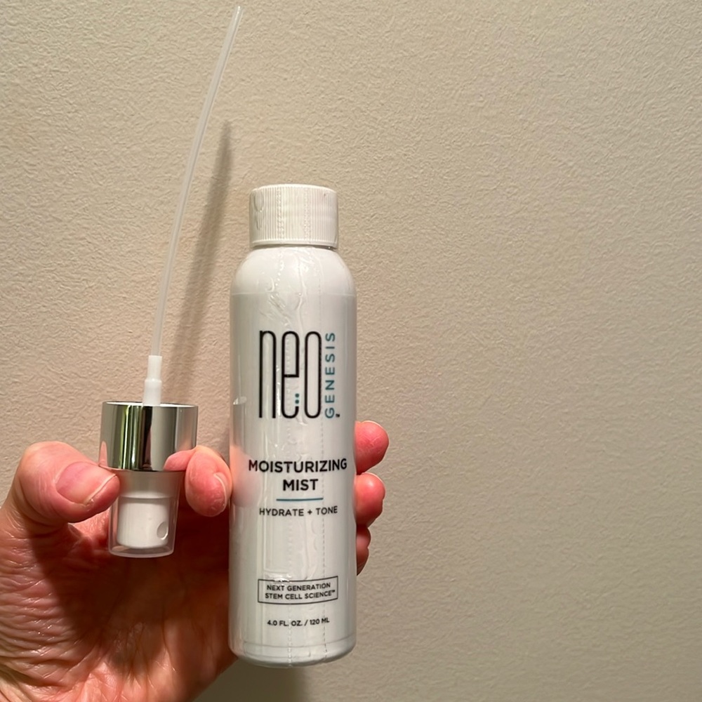 Neogenesis unopened original wrapping moisturizing mist. Includes the spray top.